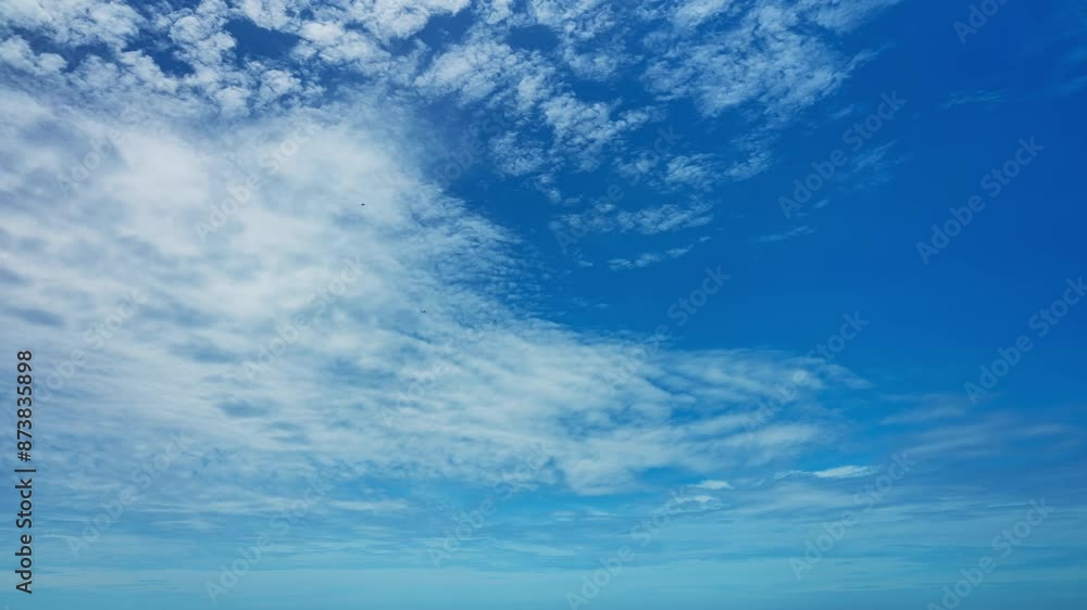 Timelapse White clouds in blue sky over sea landscape background,Beautiful Blue sky and white clouds flowing over sea in summer season Good weather day.Concept Travel background nature environment Timelapse White clouds in blue sky over sea landscape background,Beautiful Blue sky and white clouds flowing over sea in summer season Good weather day.Concept Travel background nature environment