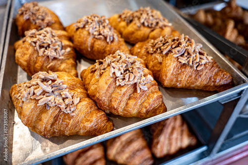 Valokuva Delicious  Sweet almond croissants on metal prate