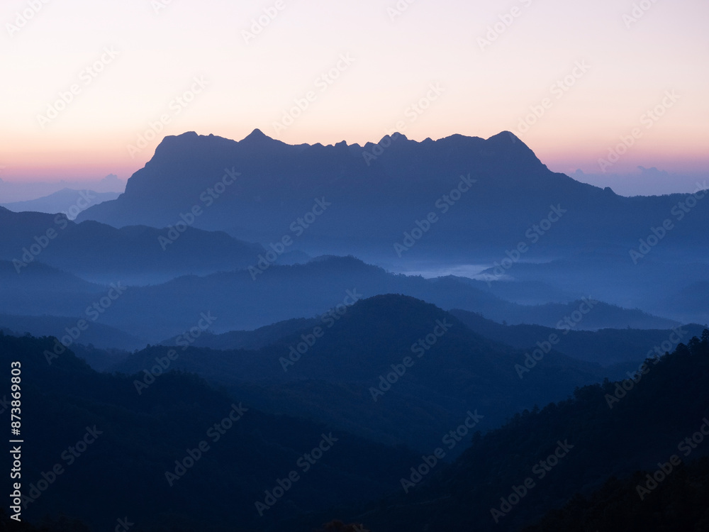 Doi Luang Chiang Dao mountain at dawn with golden hour sunrise sky. Chiang Mai - Thailand Doi Luang Chiang Dao mountain at dawn with golden hour sunrise sky. Chiang Mai - Thailand