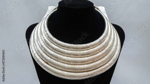 Handmade Hmong or Miao silver jewelry display on white background