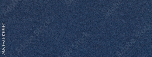 Texture of craft navy blue paper background colors, macro. Structure of vintage kraft denim cardboard