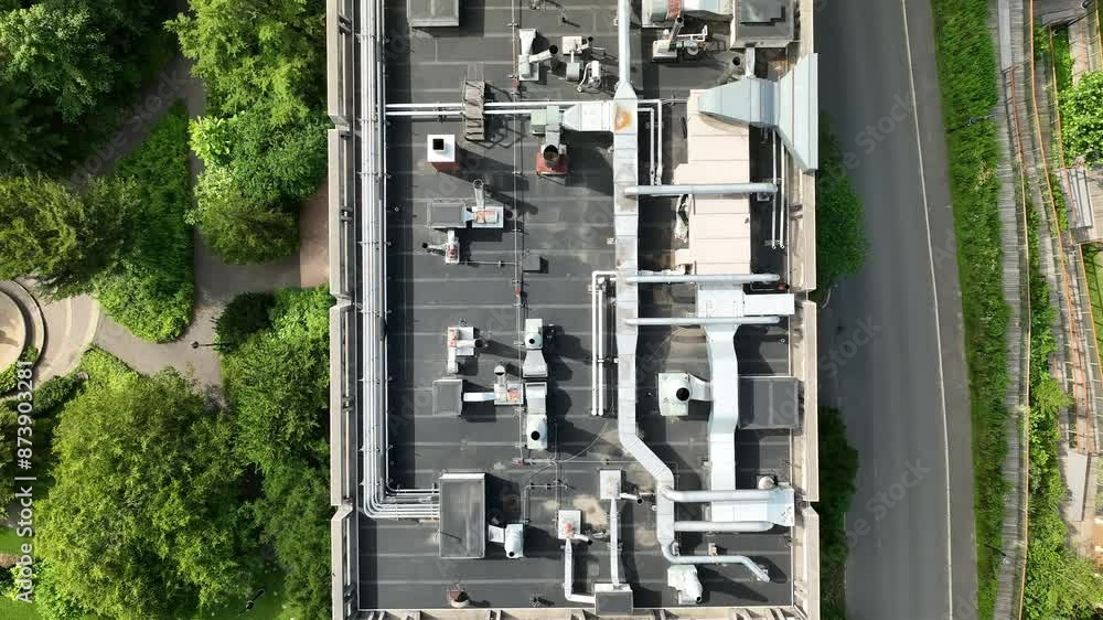 Drone top down pan over school building with HVAC ventilation system on top Drone top down pan over school building with HVAC ventilation system on top