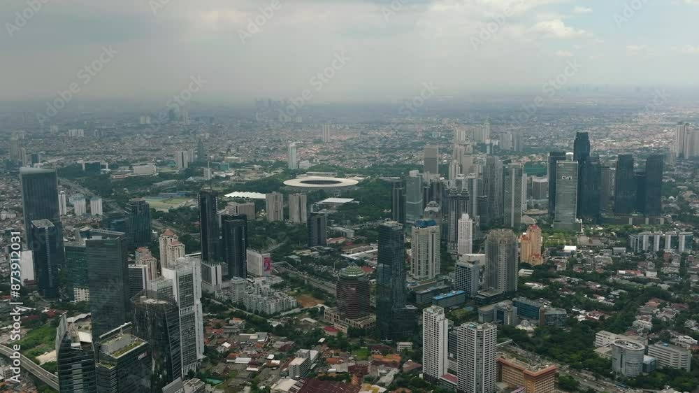 Jakarta business district in Indonesia capital city with many modern skyscrapers. Indonesia. Jakarta business district in Indonesia capital city with many modern skyscrapers. Indonesia.