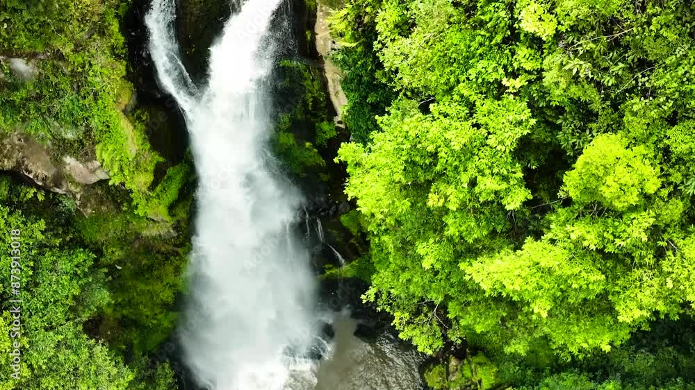 Waterfall in the jungle. Sikulikap Falls in slow motion. Sumatra, Indonesia. Waterfall in the jungle. Sikulikap Falls in slow motion. Sumatra, Indonesia.