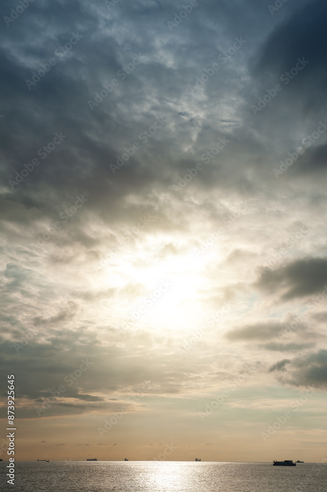 Beautiful landscape with dramatic sky, sea, ship and islands Beautiful landscape with dramatic sky, sea, ship and islands