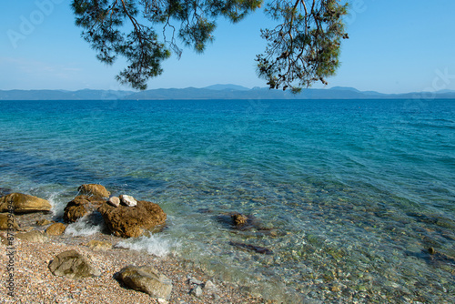 Bay views from green forests. View from the forest to the sea. Magnificent views from the forest to the sea. Magnificent bays of Muğla.