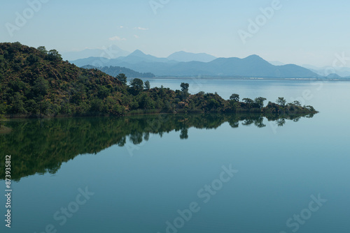 reflection of the forest in the lake.Bay views from green forests. View from the forest to the sea. Magnificent views from the forest to the sea. Magnificent bays of Muğla.