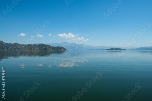 reflection of the forest in the lake.Bay views from green forests. View from the forest to the sea. Magnificent views from the forest to the sea. Magnificent bays of Muğla.