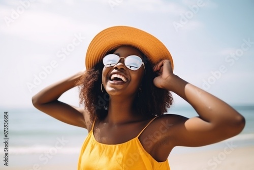 Happy Black woman laughing glasses summer. photo