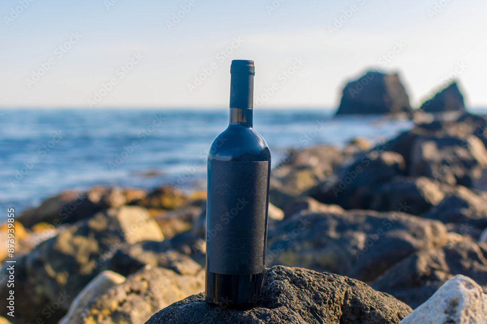 Bottle of wine by the sea