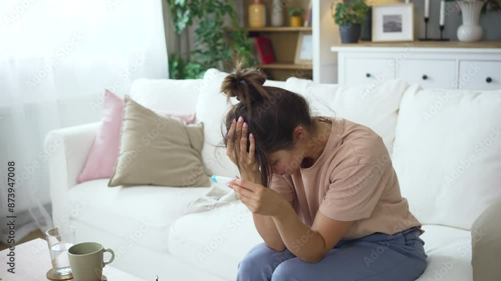 Young woman sick with colds and flu, self-medication at home with vitamins and pills. suffering from the nose due to allergies. Woman having high fever and suffering from strong headache during flu Young woman sick with colds and flu, self-medication at home with vitamins and pills. suffering from the nose due to allergies. Woman having high fever and suffering from strong headache during flu