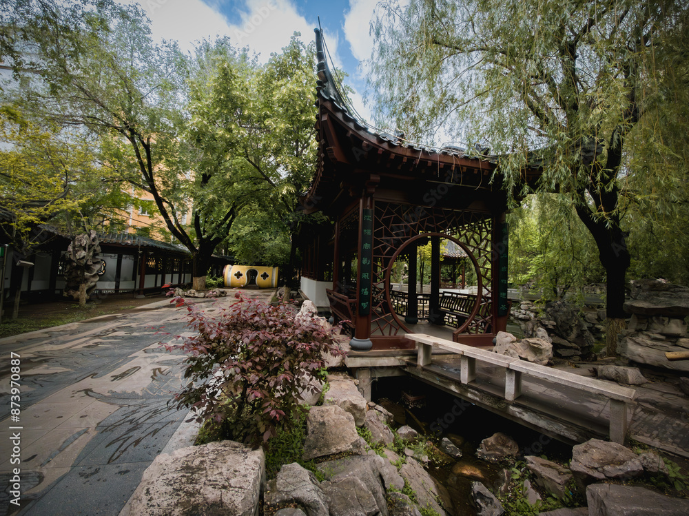 Obraz premium Beautiful scenery of the park on a rainy day, Changchun, China