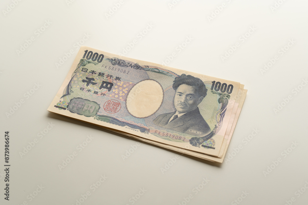 Japanese Yen banknote on white background Japanese Yen banknote on white background