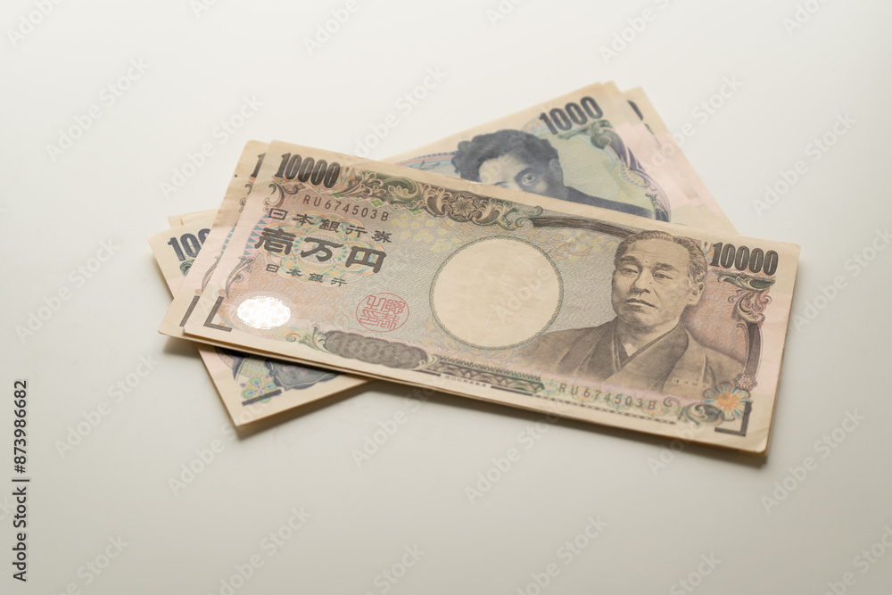 Japanese Yen banknote on white background Japanese Yen banknote on white background