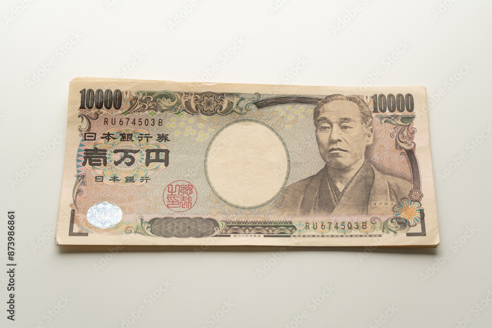 Japanese Yen banknote on white background Japanese Yen banknote on white background