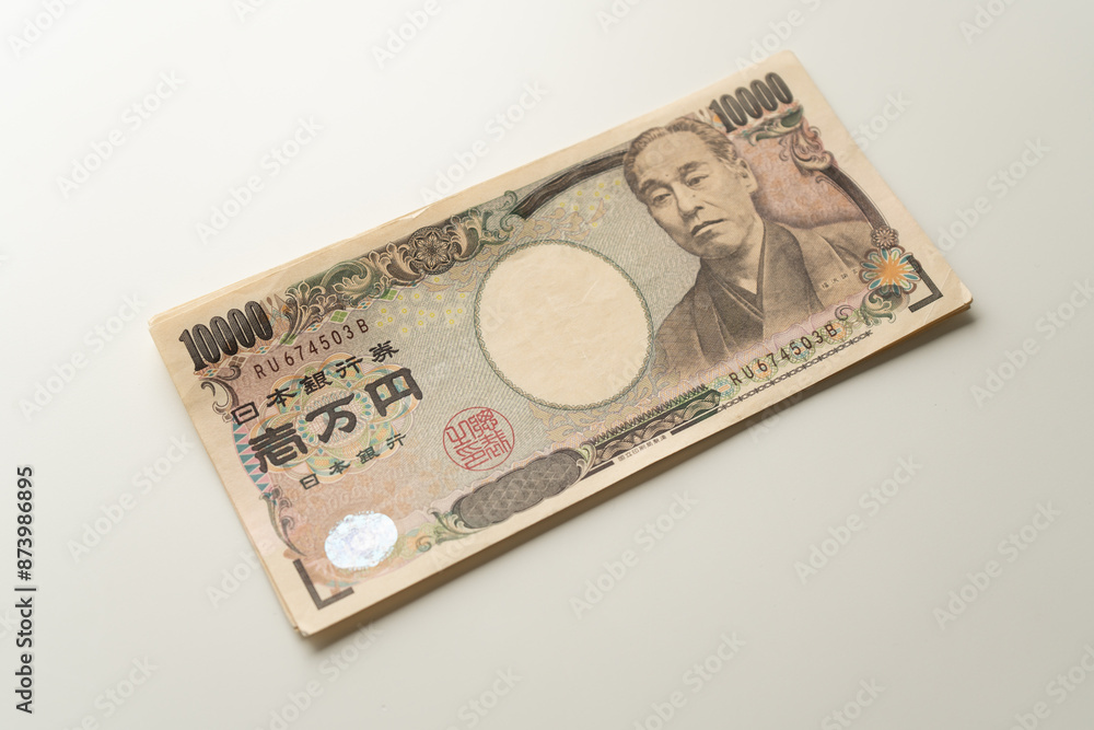 Japanese Yen banknote on white background Japanese Yen banknote on white background