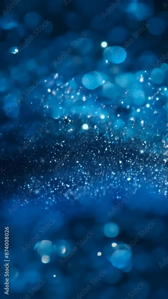 Blue background with shiny sparks and bokeh Blue background with shiny sparks and bokeh