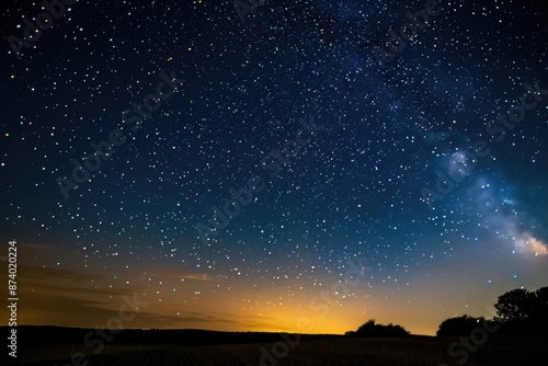 view of a clear sky full of stars at night over a landscape © DailyLifeImages