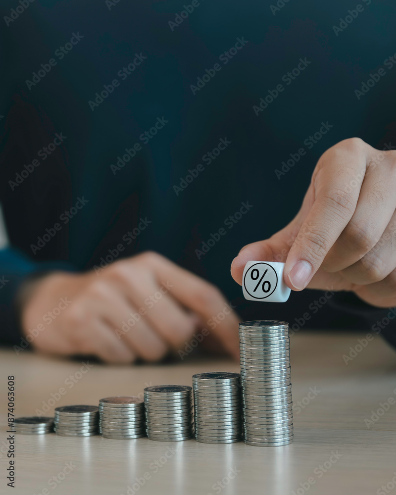 businessman stacking coins and percentage icon concept, money coins accounting for increase financial interest rate and business investment growth from dividend, Business Finance and Money.