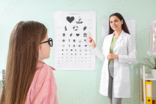 Little girl with eyeglasses...