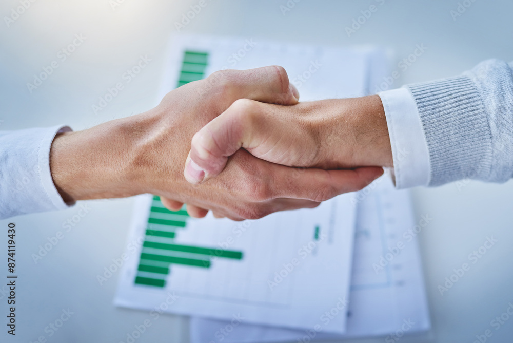 Handshake, partnership and business people in office with paperwork for B2B deal, agreement or meeting. Above, graphs and employees shaking hands for teamwork, collaboration or project data analytics Handshake, partnership and business people in office with paperwork for B2B deal, agreement or meeting. Above, graphs and employees shaking hands for teamwork, collaboration or project data analytics