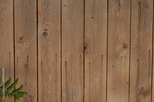 A weathered wood fence with...
