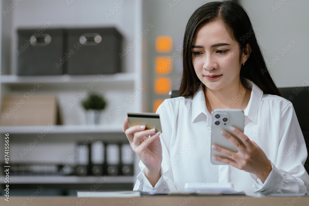 woman hand holding laptop, tablet and using credit card for online shopping.Online shopping concept. woman hand holding laptop, tablet and using credit card for online shopping.Online shopping concept.