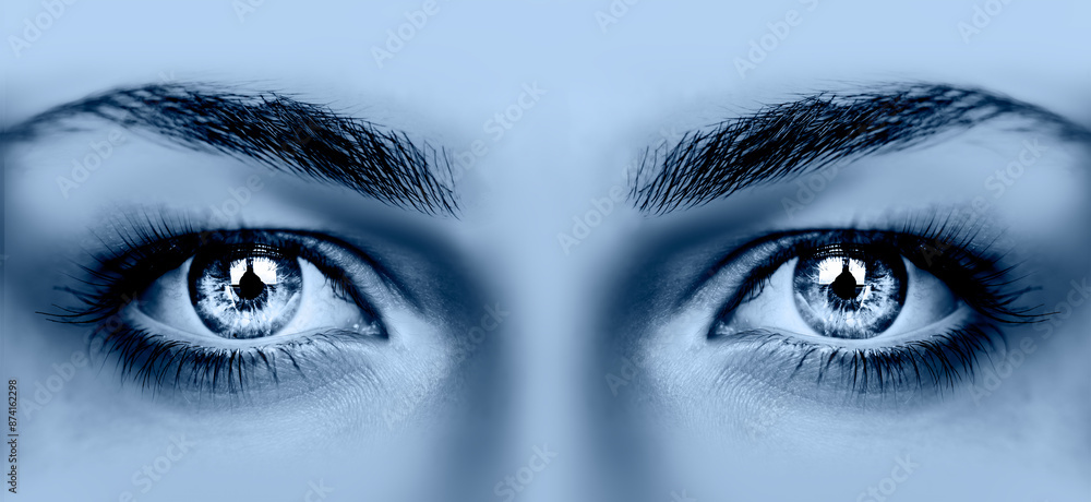 Fototapeta premium Beautiful girl eye with blue make-up.
