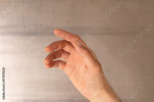 A hand reaching out towards...