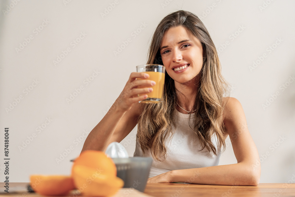 Woman Drinking Orange Juice - Healthy Lifestyle and Fresh Beverage Woman Drinking Orange Juice - Healthy Lifestyle and Fresh Beverage