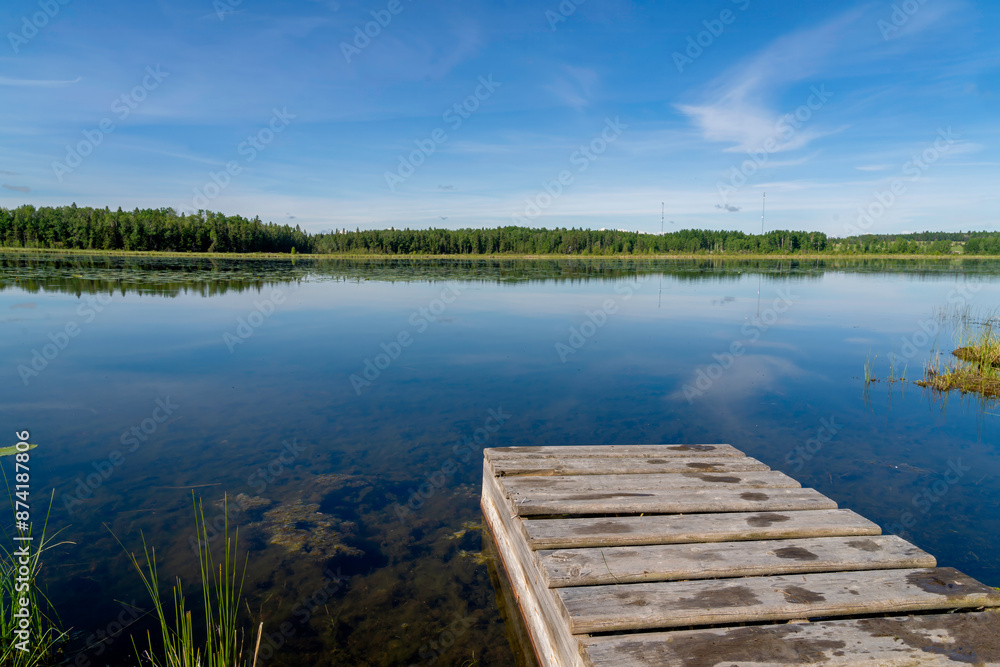 Smooth reflecting water of a peaceful lake.. Smooth reflecting water of a peaceful lake..
