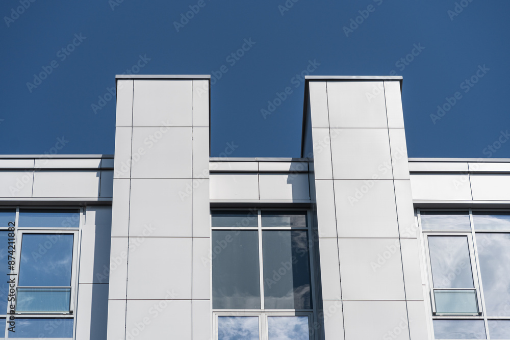 Obraz premium Facade of a modern residential building, building texture
