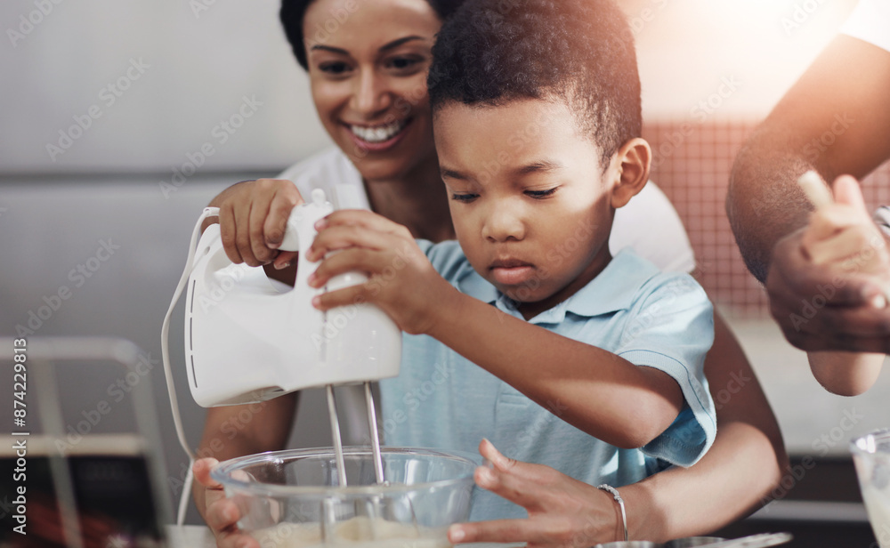 Mother, child and baking with whisk machine for bonding, family time or help in kitchen at home. Mom, son or little boy preparing cookies, dough or mixture together with ingredients in bowl for snack Mother, child and baking with whisk machine for bonding, family time or help in kitchen at home. Mom, son or little boy preparing cookies, dough or mixture together with ingredients in bowl for snack