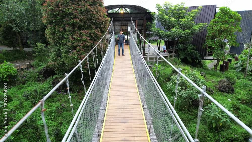 Moving forward on Wooden Bridge Leading to a Drone Pilot in Foggy Forest Moving forward on Wooden Bridge Leading to a Drone Pilot in Foggy Forest