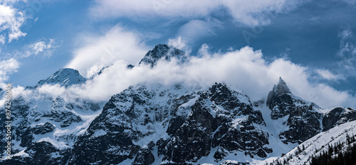 Fototapeta Naklejka Na Ścianę i Meble -  Mountain peaks near Morskie Oko or Sea Eye Lake in Poland at Winter. Tatras range