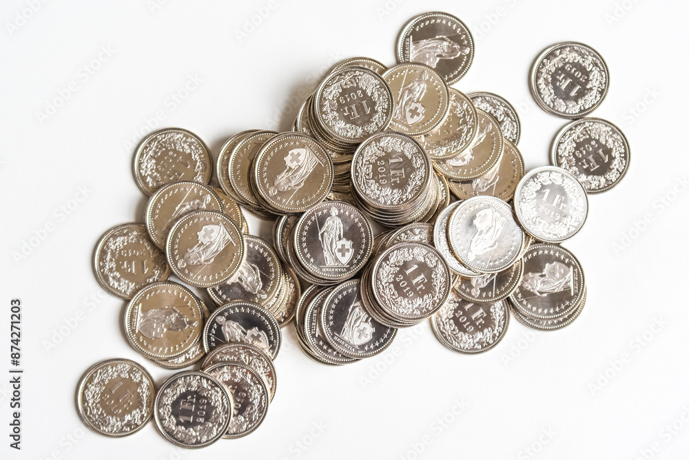 coins spread on white background
