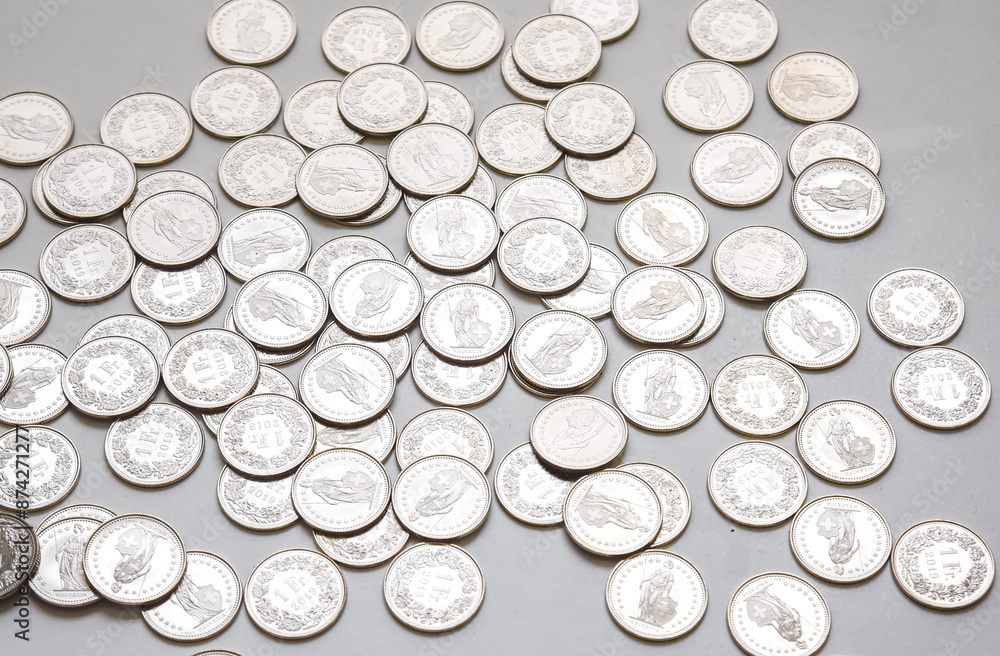 coins spread on white background