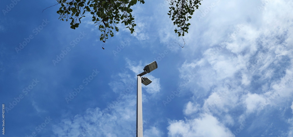 A modern street LED lighting pole. LED Street Light on blue sky, cloud background. electro-energy technologies. Outdoor LED Lighting. Solar panel street light - Eco-friendly
A modern street LED lighting pole. LED Street Light on blue sky, cloud background. electro-energy technologies. Outdoor LED Lighting. Solar panel street light - Eco-friendly