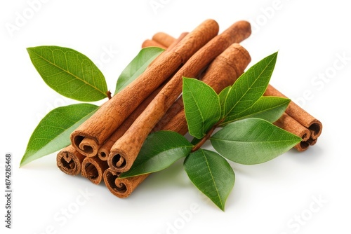 Ceylon cinnamon sticks and fresh cinnamon leaves isolated on white  cinnamon photo