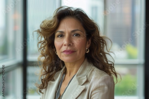 Free Download Portrait of a middle aged businesswoman in office - GFXLoad