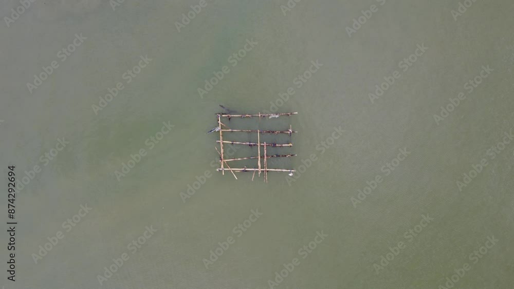 Fisherman's fish traps placed in the sea are made of wood Fisherman's fish traps placed in the sea are made of wood