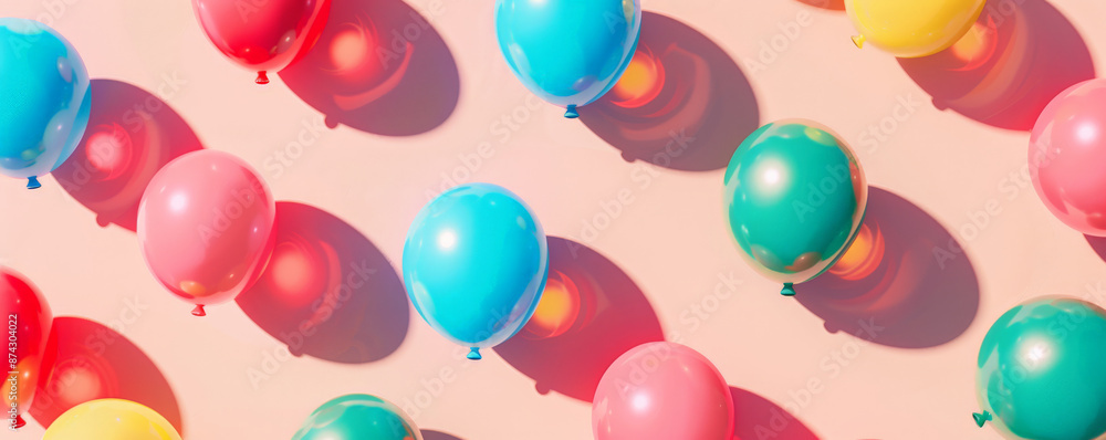 A lively background featuring balloons in shades of red, blue, yellow, and green, arranged in a dynamic pattern against a light pink backdrop. A lively background featuring balloons in shades of red, blue, yellow, and green, arranged in a dynamic pattern against a light pink backdrop.