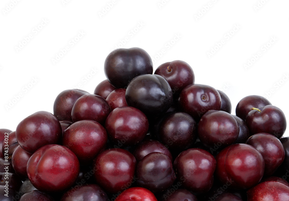 Cherry plums isolated on white, room for text. Cherry plums isolated on white, room for text.