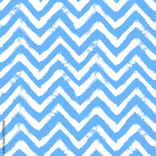 Vector chevron pattern. Seamless blue and white brush stroke background. Zig zag print with distress texture. Painted ornament for kids. Childish design
