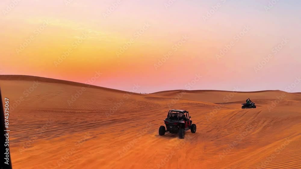 Silhouette dune buggy explores the abandoned terrain of the sweltering desert during a sunset sandstorm. High quality 4k footage Silhouette dune buggy explores the abandoned terrain of the sweltering desert during a sunset sandstorm. High quality 4k footage