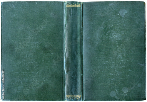 Konstfotografi Antique open book cover in green canvas with embossed golden elements on spine -