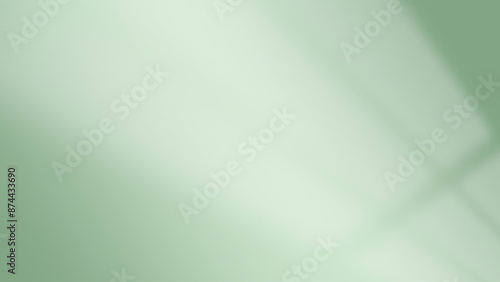 Green abstract background. Abstract green gradient. Minimalist futuristic background. Concept of light shadow background from window