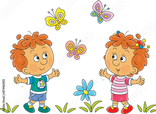 Happy little girl and boy playing with flying colorful butterflies on a warm summer day, vector cartoon illustration isolated on a white background