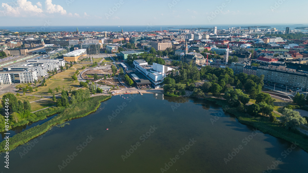 Fototapeta premium Helsinki city capital fo Finland. These drone photos capture the beautiful city of Helsinki from the sky, showcasing its stunning architecture, vibrant cityscape, and the harmonious blend of modernity