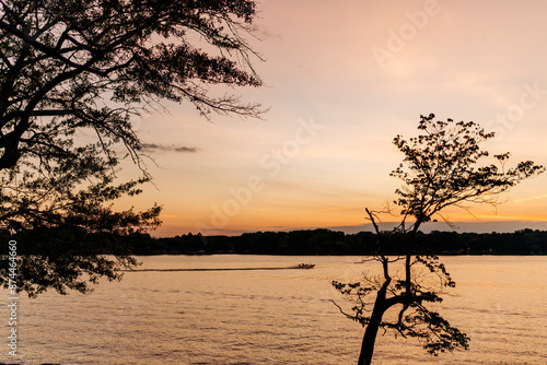 Beautiful sky and lake at sunset. Beautiful orange and blue sky at dawn. Lake Bowen Anchor Park, Inman, SC, USA  photo